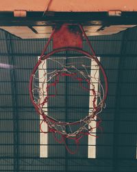 Low angle view of basketball hoop against wall