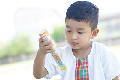 Boy holding ice cream