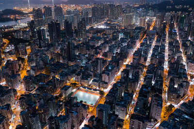Aerial view of illuminated cityscape at night