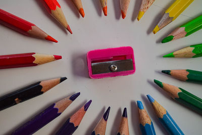 High angle view of multi colored pencils on table