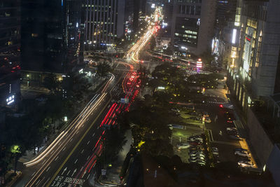 High angle view of light trails on city street at night