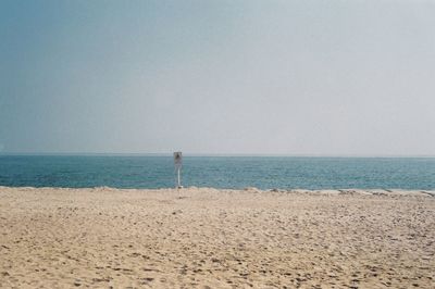 Seascape in thailand with warning sign