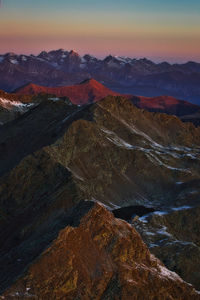 Scenic view of mountains against sky during sunset
