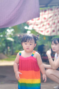 Portrait of cute girl looking away