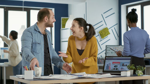 Business colleagues working in office