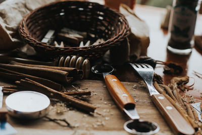 High angle view of tools on table at workshop