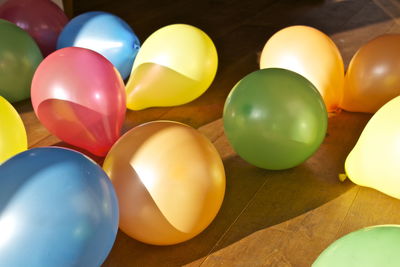 Colorful balloons scattered on floor