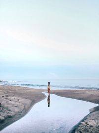 Scenic view of calm sea against sky