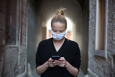 Young woman using mobile phone