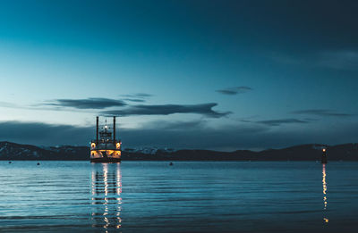 Sailboat in sea against sky