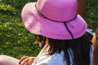 Rear view of girl wearing hat