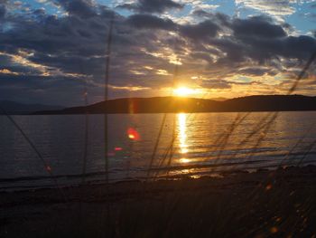 View of calm sea at sunset