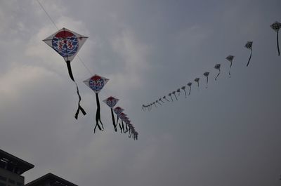 Low angle view of flying in sky