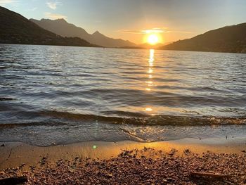 Scenic view of sea against sky during sunset