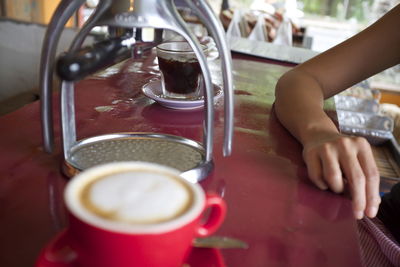 Close-up of coffee cup in cafe