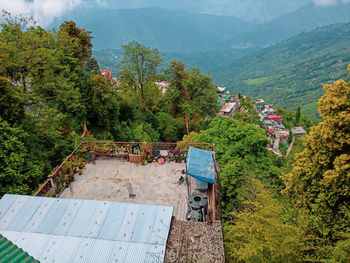 High angle view of trees and mountains against sky