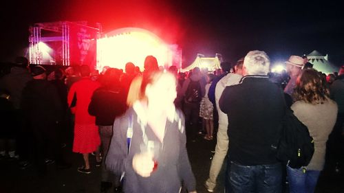 People enjoying at concert