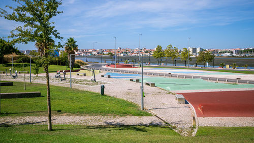 View of swimming pool by sea against sky