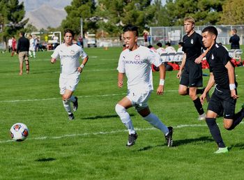 Group of people on soccer field