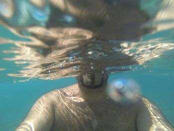 Close-up of water against blue sky