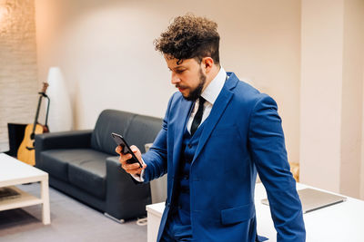 Young man using mobile phone