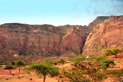 Rock formations on mountain against sky