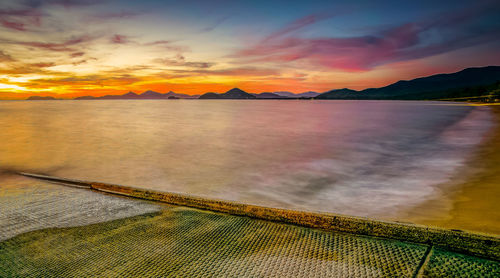 Scenic view of sunset over sea