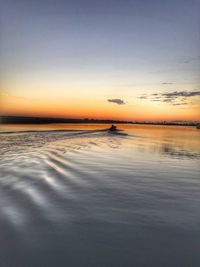 View of calm sea at sunset