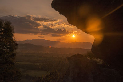 Scenic view of mountains against sky during sunset