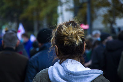 Rear view of woman with umbrella