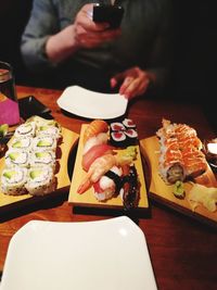 Close-up of sushi served on table