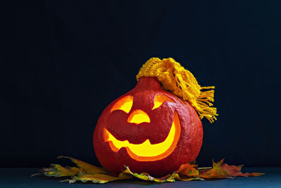 Close-up of pumpkin against black background