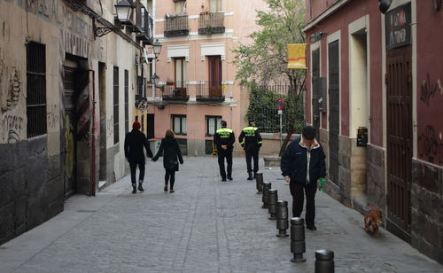 People walking in alley