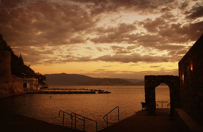 Scenic view of dramatic sky during sunset