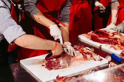 Meat processing of deer at butcher workshop