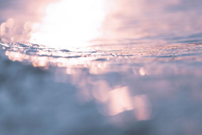 Close-up of reflection of clouds in water