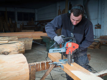 Man working on wood