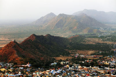 High angle view of residential district and mountains