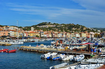 High angle view of harbor by sea against sky