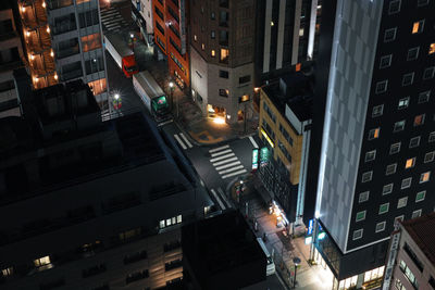 Low angle view of illuminated buildings at night