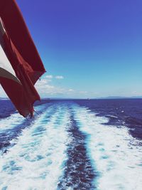 Scenic view of sea against blue sky