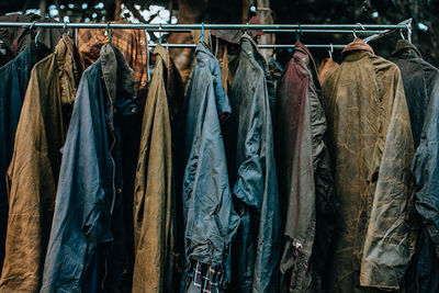 Close-up of clothes hanging on rack