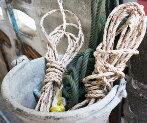 High angle view of rope tied up in basket