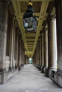 Walkway in illuminated corridor