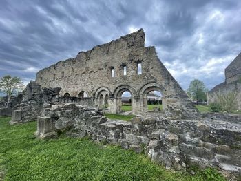 Old ruin building against cloudy sky