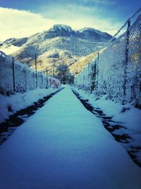 Scenic view of snow covered mountains
