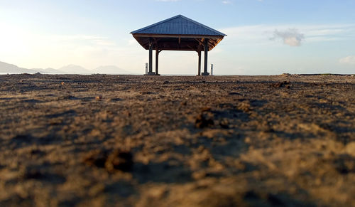 Built structure on land against sky