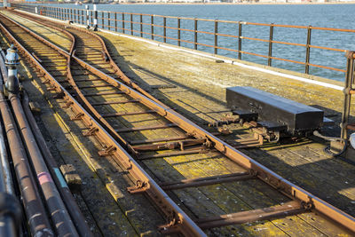 High angle view of railroad tracks by sea