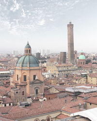 View of buildings in city against sky