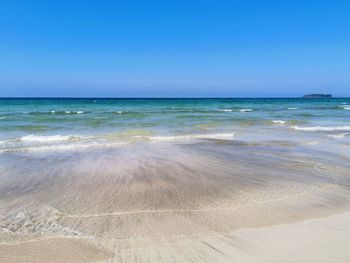 Scenic view of sea against clear sky